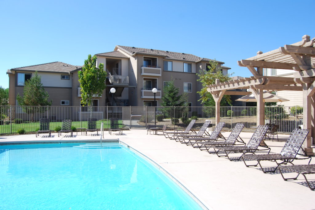 apartment complex with a pool 